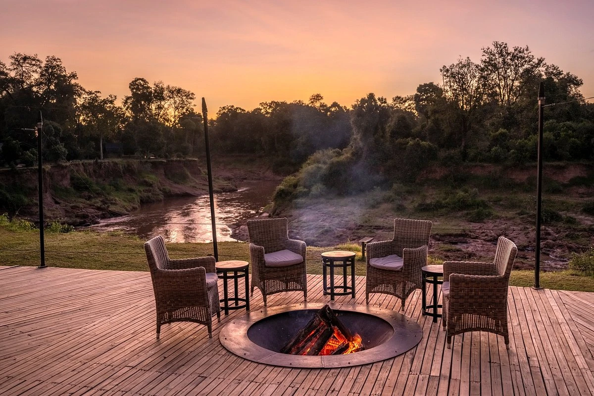 Sunken fire pit, Sundowner set up at Governors' Il Moran Masai Mara Camp.